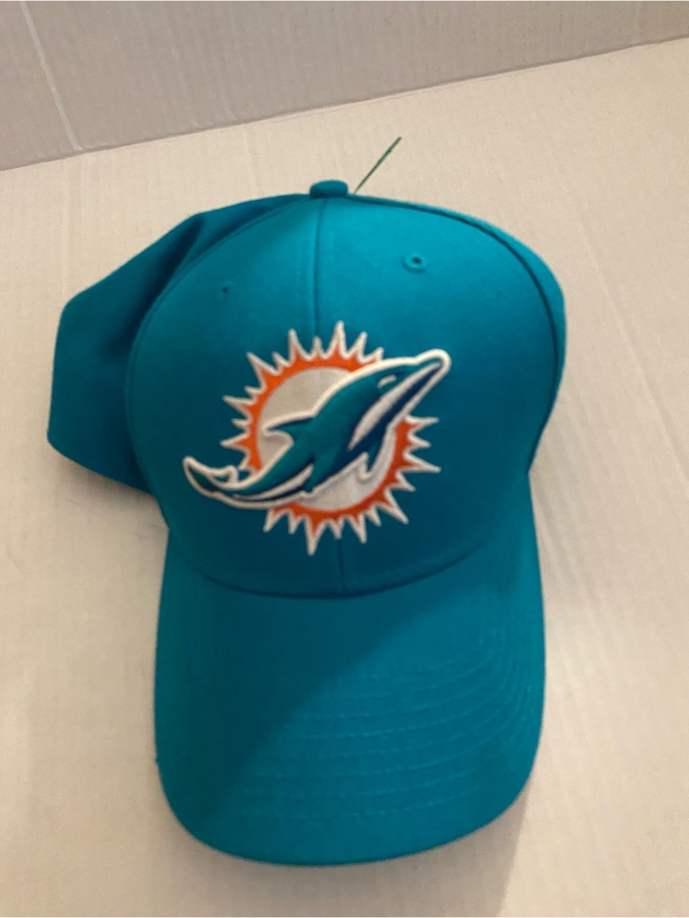 Source Unknown Teal Dolphins Logo Baseball Cap with Orange Accent